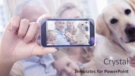  Presentation with children parents - Presentation theme featuring hand holding smartphone showing against parents and their children on sofa with labrador social distancing and self isolation in quarantine lockdown for coronavirus covid19 background and a light gray colored foreground