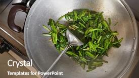  Presentation with movement - Slide deck with hand holding spatula stirring the vegetable - japanese spinach or po chai on the wok movement blur might be noticeable background and a gray colored foreground