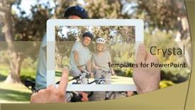  Presentation with tablet - Presentation theme with hand holding tablet pc showing elderly couple with their bikes background and a coral colored foreground