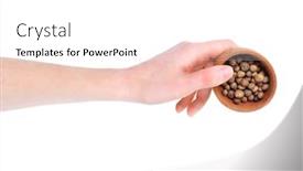  Presentation with allspice - Colorful theme enhanced with hand holding wooden bowl with aromatic allspice isolated on white backdrop and a pink colored foreground