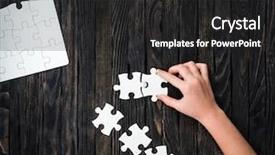  Presentation with puzzle pieces - Presentation enhanced with hand starting to collect puzzle background and a dark gray colored foreground