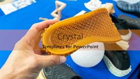  Presentation with shoe - Colorful PPT layouts enhanced with hand-with-3d-printed-shoe backdrop and a gold colored foreground