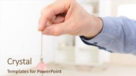  Presentation with crystal pink quartzs - PPT theme featuring hand with pink crystal pendulum background and a sky blue colored foreground