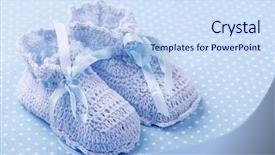  Presentation with baby christening - PPT theme consisting of handmade blue baby booties background and a sky blue colored foreground