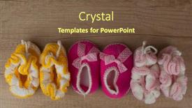  Presentation with baby shoes - Colorful presentation theme enhanced with handmade-knitting-baby-shoes backdrop and a tawny brown colored foreground