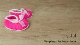  Presentation with baby shoes - Cool new PPT theme with handmade-knitting-baby-shoes backdrop and a coral colored foreground