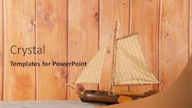  Presentation with sailboat - Slide set featuring handmade wooden miniature sailboat from holland background and a coral colored foreground