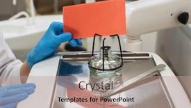  Presentation with dental laboratory - Amazing PPT theme having hands dentist woman holding wax over thealcohol burner or spirit lamp in dental clinic laboratory equipment medicine and science stomatology and healthcare concept backdrop and a coral colored foreground