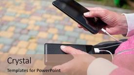  Presentation with power bank - Cool new PPT theme with hands holding black smartphone charging backdrop and a coral colored foreground