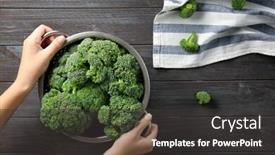  Presentation with fresh green broccoli - Presentation theme having hands holding colander with fresh green broccoli with brown wooden table on background background and a dark gray colored foreground