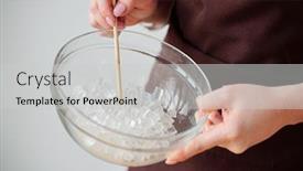  Presentation with holding hands - Presentation theme featuring hands of contemporary craftswoman holding glassware with cubes of cut transparent soap mass background and a light gray colored foreground