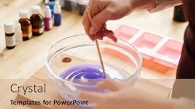  Presentation with molds - Presentation having hands of creative girl mixing lavender color with liquid soap mass in glassware before pouring it into silicone molds background and a coral colored foreground
