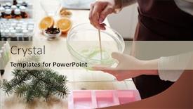  Presentation with molds - Presentation theme having hands of female mixing liquid soap mass with green color in glassware over pink silicone molds background and a soft green colored foreground