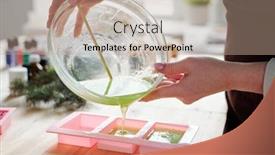  Presentation with molds - Presentation with hands of young female pouring liquid soap mass with green color from glassware into pink silicone molds background and a coral colored foreground