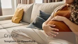  Presentation with pregnant woman - PPT theme enhanced with hands-of-young-pregnant-woman background and a coral colored foreground
