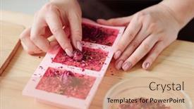  Presentation with molds - Colorful slide set enhanced with hands of young woman putting small rosebuds on top of pink soap bars in silicone molds while finishing creative work backdrop and a coral colored foreground