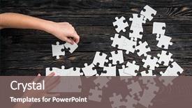  Presentation with puzzle pieces flying in - Slide deck consisting of hands starting to collect puzzle background and a gray colored foreground