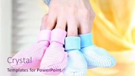  Presentation with crocheted - Amazing PPT theme having hands with crocheted booties for baby on light background backdrop and a pink colored foreground
