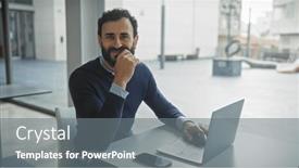  Presentation with laptop - PPT theme consisting of handsome-bearded-man-working and a gray colored foreground