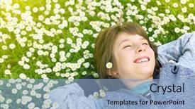  Presentation with teen - Slide deck enhanced with handsome happy smiling young boy lying on summer meadow green grass with daisy attractive smiling teen boy posing over nature background image toned background and a light blue colored foreground