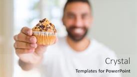  Presentation with muffin - Colorful presentation enhanced with handsome hispanic man eating chocolate chips muffin with a happy face standing and smiling with a confident smile showing teeth backdrop and a sky blue colored foreground