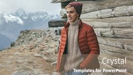  Presentation with winter weather - Beautiful presentation featuring handsome male model wearing warm sweater winter coat and hat posing over mountains with snow active fashion clothes for cold weather backdrop and a coral colored foreground