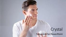  Presentation with cream - PPT theme enhanced with handsome man applying face cream background and a light gray colored foreground