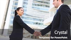  Presentation with handshake - Audience pleasing PPT theme consisting of handsome man at office building backdrop and a dark gray colored foreground