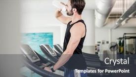  Presentation with treadmill - Amazing PPT theme having handsome man drinking water on treadmill at the gym backdrop and a dark gray colored foreground