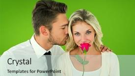 Presentation with green - Audience pleasing theme consisting of handsome man kissing girlfriend on cheek holding a rose against green vignette backdrop and a soft green colored foreground