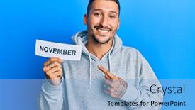  Presentation with november - Slide set having handsome-man-with-tattoos-holding background and a light blue colored foreground
