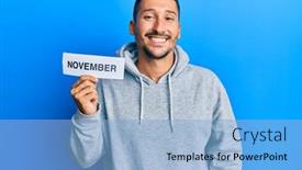  Presentation with november - PPT theme with handsome-man-with-tattoos-holding background and a light blue colored foreground