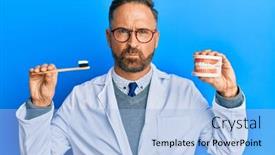  Presentation with denture - PPT theme consisting of handsome-middle-age-dentist-man background and a light blue colored foreground