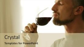  Presentation with wine tasting - Amazing PPT theme having handsome middle-aged man tasting red wine close-up backdrop and a soft green colored foreground