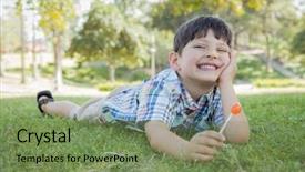  Presentation with lollipop - Presentation theme consisting of handsome young boy enjoying his lollipop outdoors on the grass background and a seafoam green colored foreground