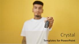  Presentation with car key - PPT theme having handsome-young-latin-man-showing and a yellow colored foreground