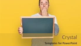  Presentation with blackboard - Slides consisting of handsome-young-man-holding-blackboard background and a  colored foreground
