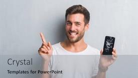  Presentation with broken wall - Slide deck consisting of handsome young man over grey grunge wall showing broken smartphone screen very happy pointing with hand and finger to the side background and a light gray colored foreground