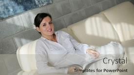  Presentation with living room - Amazing PPT theme having happpy-young-woman-reading-magazina backdrop and a light gray colored foreground