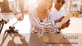  Presentation with motorbike - Presentation theme featuring happy african couple sitting on modern motorbike and using tablet computer on the street background and a coral colored foreground