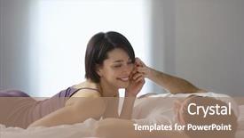  Presentation with young happy couple - Slide set having happy and playful young couple lying in bed background and a coral colored foreground