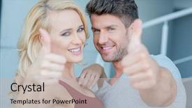  Presentation with faces - Theme consisting of happy attractive couple giving a thumbs up gesture of approval and success while standing close together focus to their faces background and a soft green colored foreground