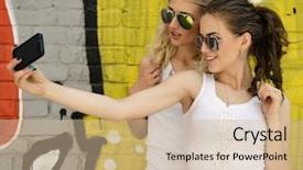  Presentation with graffiti - Audience pleasing PPT theme consisting of happy attractive girls with smart phone take selfie against urban grunge graffiti wall backdrop and a soft green colored foreground