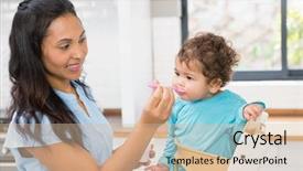  Presentation with happy baby - Audience pleasing PPT layouts consisting of happy brunette feeding her baby backdrop and a  colored foreground