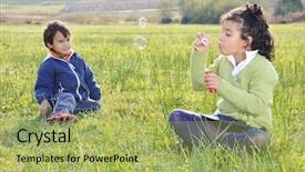  Presentation with childhood - Audience pleasing presentation theme consisting of happy childhood on green beautiful meadow backdrop and a yellow colored foreground