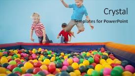  Presentation with children playing - Beautiful presentation theme featuring happy children playing in ball backdrop and a light blue colored foreground
