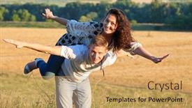 Presentation with fun - Theme with happy couple having fun on outdoor girl riding on man back and fly - romantic travel and people concept summer landscape with wheaten field background and a yellow colored foreground