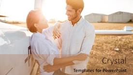  Presentation with honeymoon - PPT layouts consisting of happy couple on a honeymoon standing at the airplane field at sunset background and a coral colored foreground