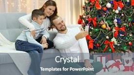  Presentation with family photo - PPT layouts having happy family making photo in home holiday living room background and a ocean colored foreground