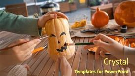  Presentation with children painting - PPT theme having happy-family-preparing-for-halloween background and a tawny brown colored foreground